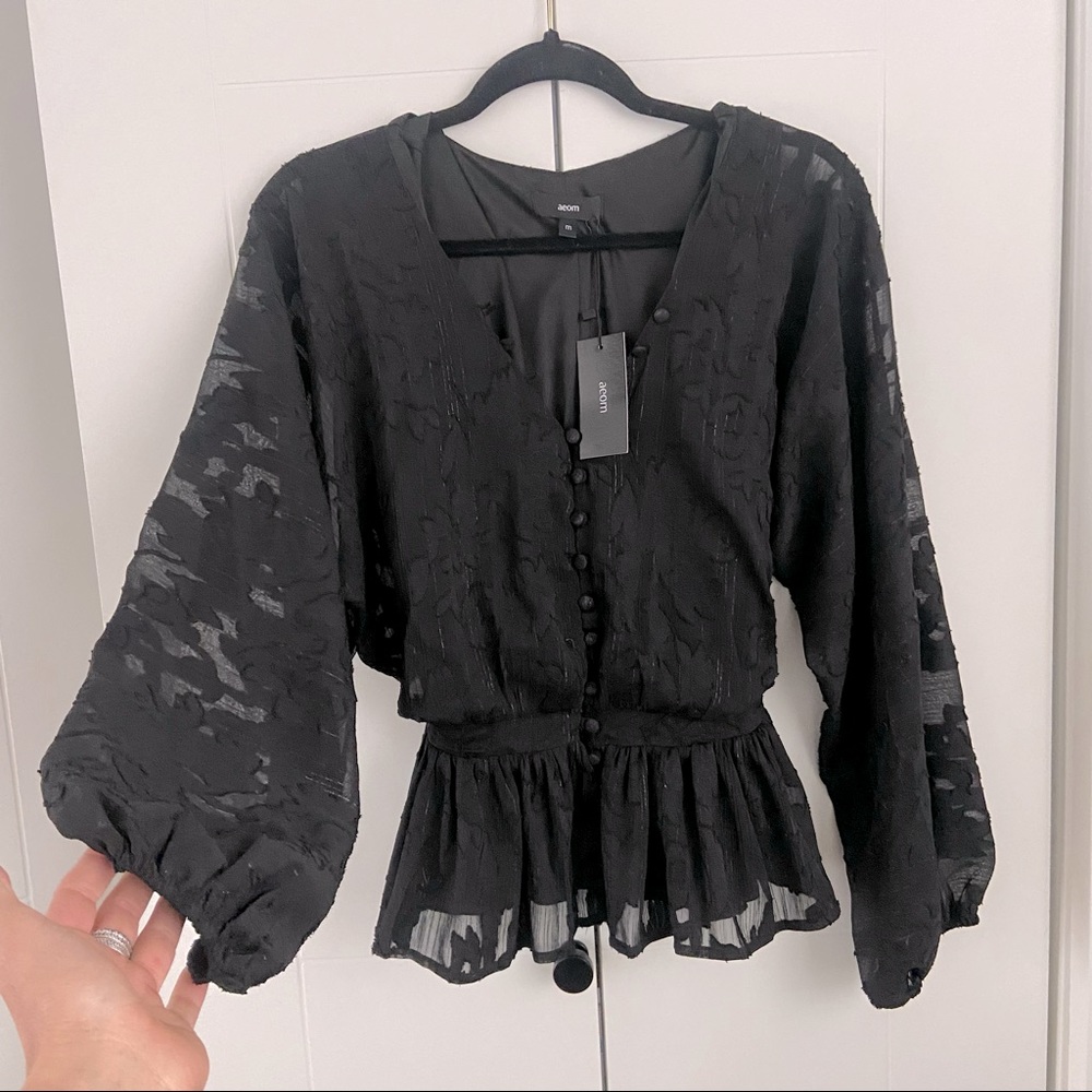 Aeom black long sleeve blouse with semi sheer sleeves, v neck, button detail.